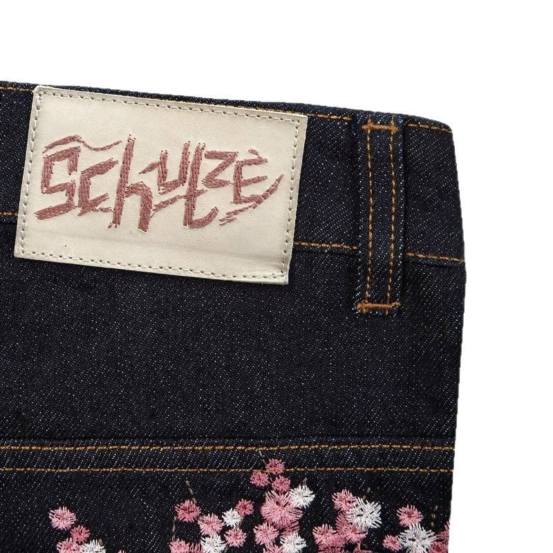 JEANS EN DENIM VINTAGE BRODERIE DE FLEURS DE PRUNIER