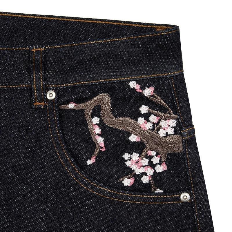 JEANS EN DENIM VINTAGE BRODERIE DE FLEURS DE PRUNIER